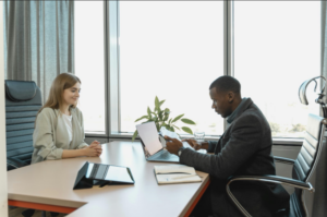 Worker meeting with boss.
